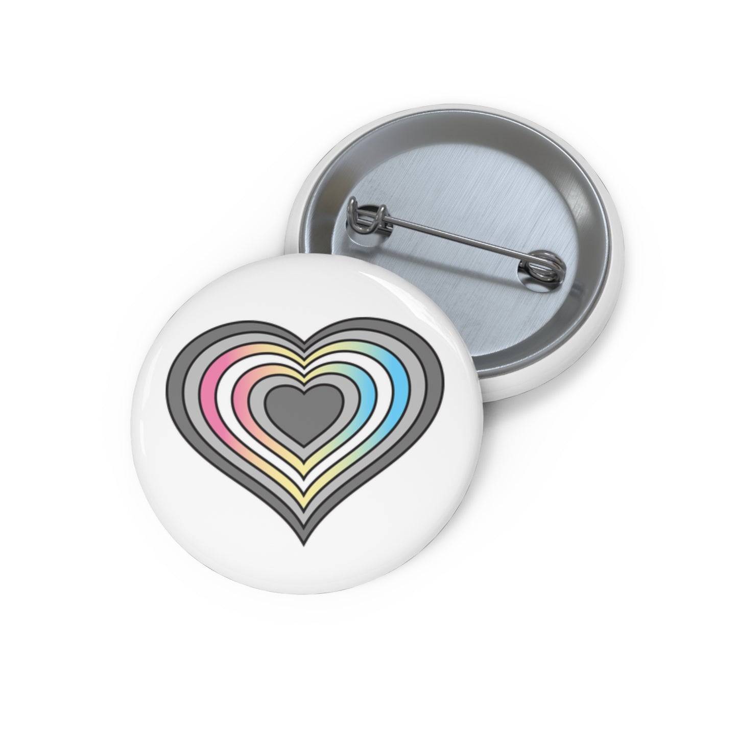 Front and back view of a white circular button with a heart-shaped demifluid inspired flag image. The button is shown on a white background.