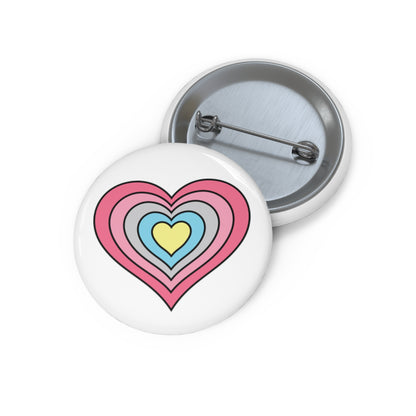 Front and back view of a white circular button with a heart-shaped genderflux flag image. The button is shown on a white background.