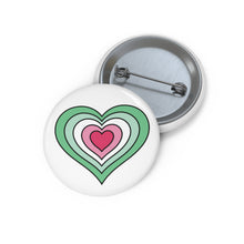 Front and back view of a white circular button with a heart-shaped abrosexual flag image. The button is shown on a white background.