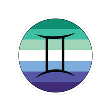Circular gay men pride flag zodiac sticker with a thin black outline and white sticker border, featuring a centered black Gemini zodiac glyph. The sticker is shown on a white background.
