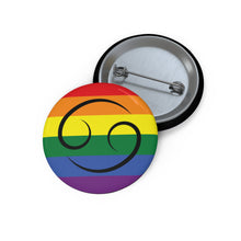 Front and back view of a circular rainbow pride flag button featuring the Cancer zodiac symbol in black centered on the front.