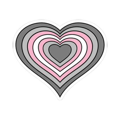 Heart-shaped demigirl pride flag sticker featuring nested heart stripes in dark gray, light gray, pink, and white outlined with a thin black border and a white sticker border. The sticker is shown on a white background.