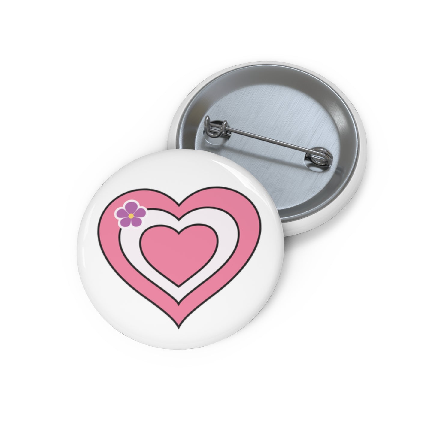 Front and back view of a circular pride button featuring a nested heart design inspired by the sapphic pride flag in pink, white, and pink with a purple hear on the left side of the hearts. The design has a thin black border, and the button is shown on a white background.