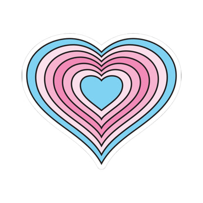 Heart-shaped transfeminine pride flag sticker featuring nested heart stripes in light blue, pale pink, light pink, pink, light pink, pale pink, and light blue, outlined with a thin black border and a white sticker border. The sticker is shown on a white background.
