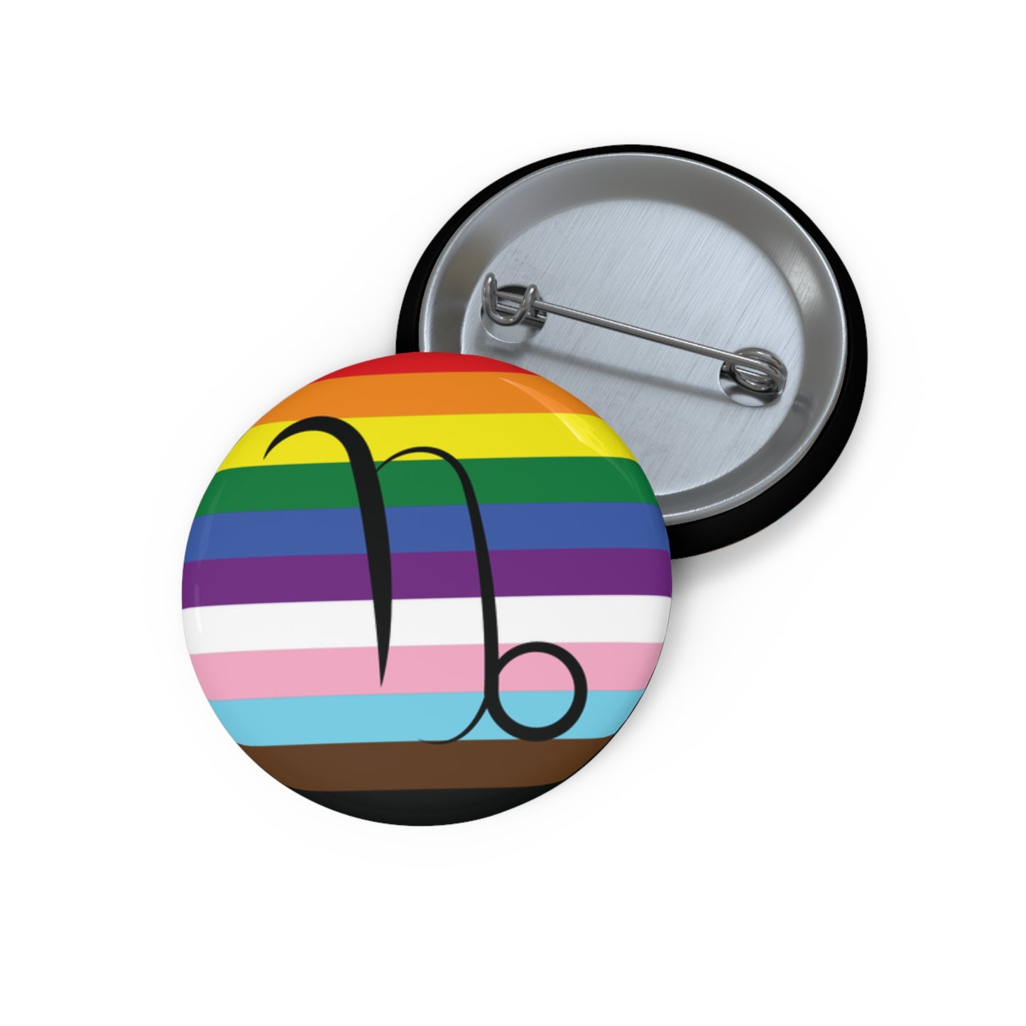 Front and back view of a circular progress pride flag button featuring the Capricorn zodiac symbol in black centered on the front.