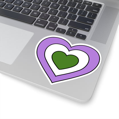 Close-up of the bottom right corner of a silver laptop featuring a 4 inch by 4 inch pride flag heart sticker in a Genderqueer flag style applied to the surface.