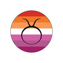 Circular lesbian pride flag zodiac sticker with a thin black outline and white sticker border, featuring a centered black Taurus zodiac glyph. The sticker is shown on a white background.