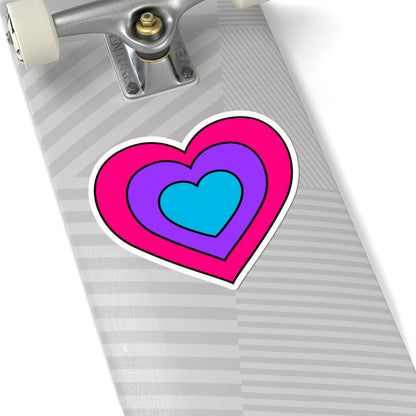 Close-up of the bottom of a silver skateboard featuring a 6 inch by 6 inch pride flag heart sticker in an Androgyne flag style applied to the surface.