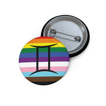 Front and back view of a circular progress pride flag button featuring the Gemini zodiac symbol in black centered on the front.