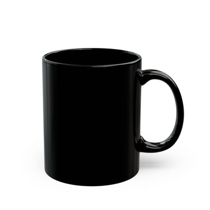 A black mug is shown on a white background. Nothing is printed on this side of the mug. The handle is on the right.