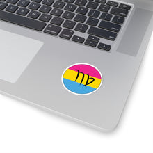 Close-up of the bottom right corner of a silver laptop featuring a 2 inch by 2 inch circular zodiac sticker with a centered Virgo glyph on a Pansexual pride flag style background applied to the surface.