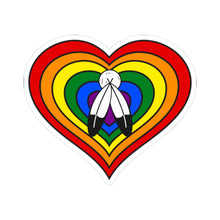 Heart-shaped two-spirit pride flag sticker featuring nested heart stripes in red, orange, yellow, green, blue, and purple with two white and black feathers in the middle outlined with a thin black border and a white sticker border. The sticker is shown on a white background.