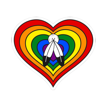 Heart-shaped two-spirit pride flag sticker featuring nested heart stripes in red, orange, yellow, green, blue, and purple with two white and black feathers in the middle outlined with a thin black border and a white sticker border. The sticker is shown on a white background.