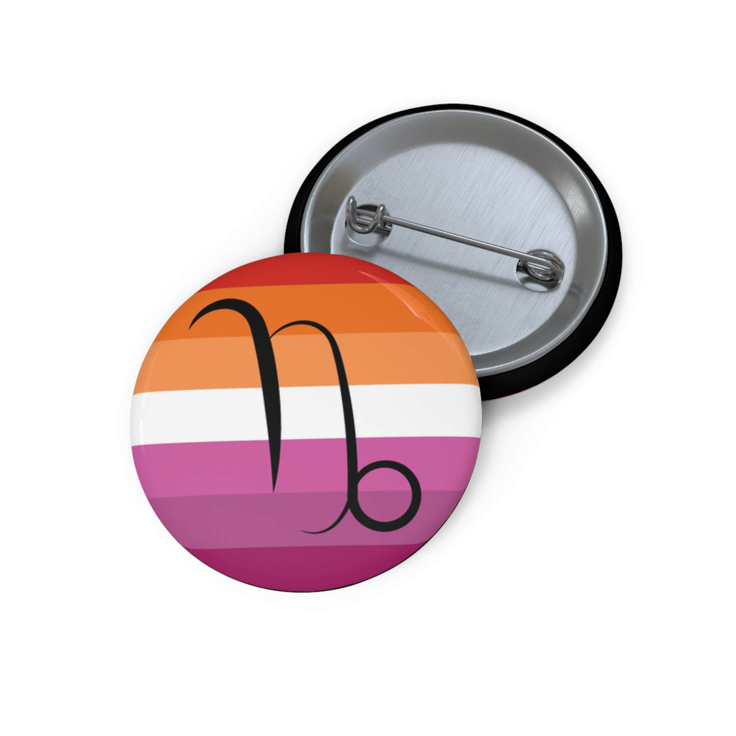 Front and back view of a circular lesbian pride flag button featuring the Capricorn zodiac symbol in black centered on the front.