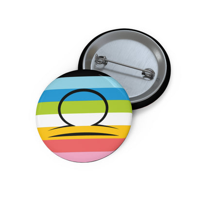 Front and back view of a circular queer pride flag button featuring the Libra zodiac symbol in black centered on the front.