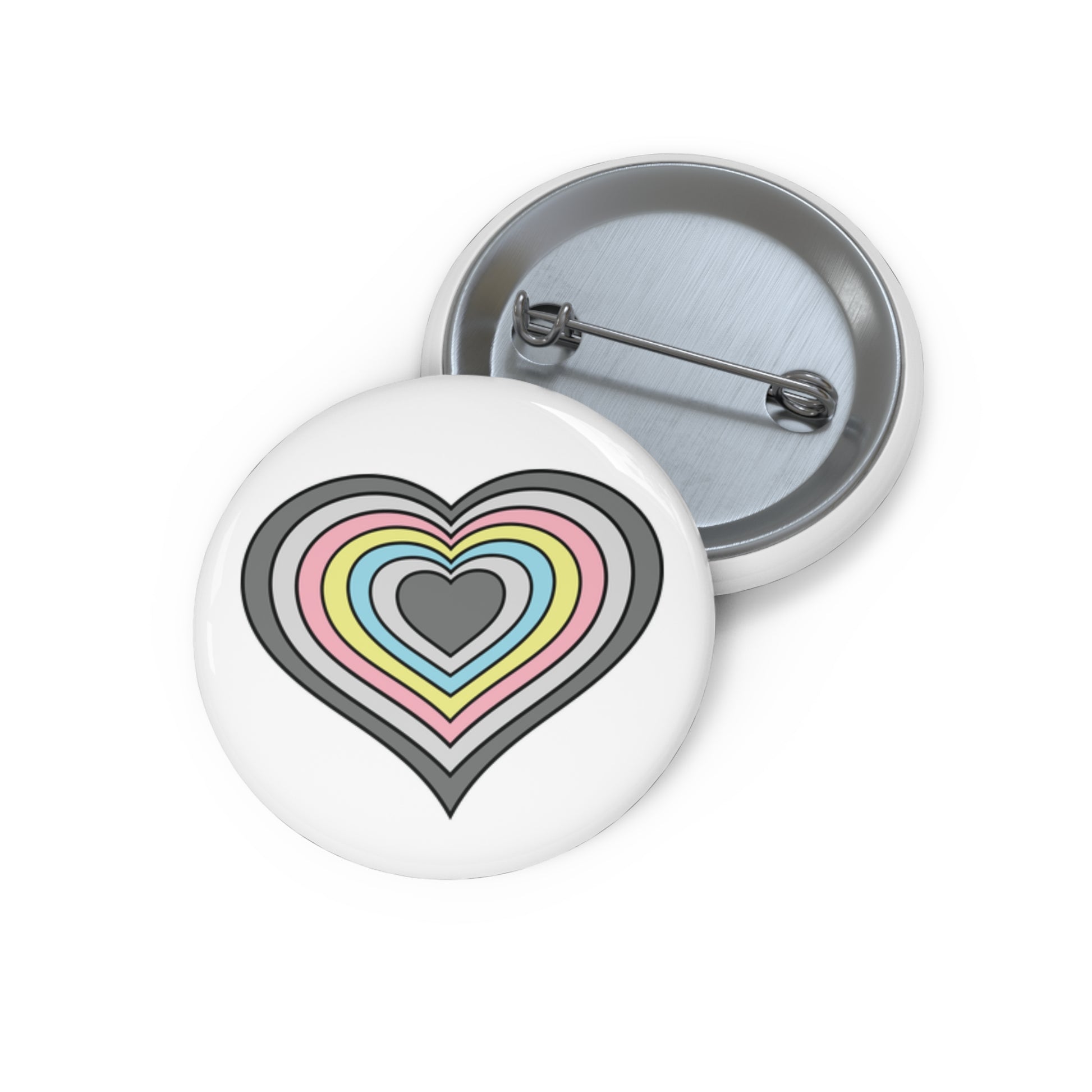 Front and back view of a white circular button with a heart-shaped demiflux flag image. The button is shown on a white background.