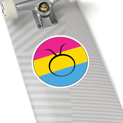 Close-up of the bottom of a silver skateboard featuring a 6 inch by 6 inch circular zodiac sticker with a centered Taurus glyph on a Pansexual pride flag style background applied to the surface.