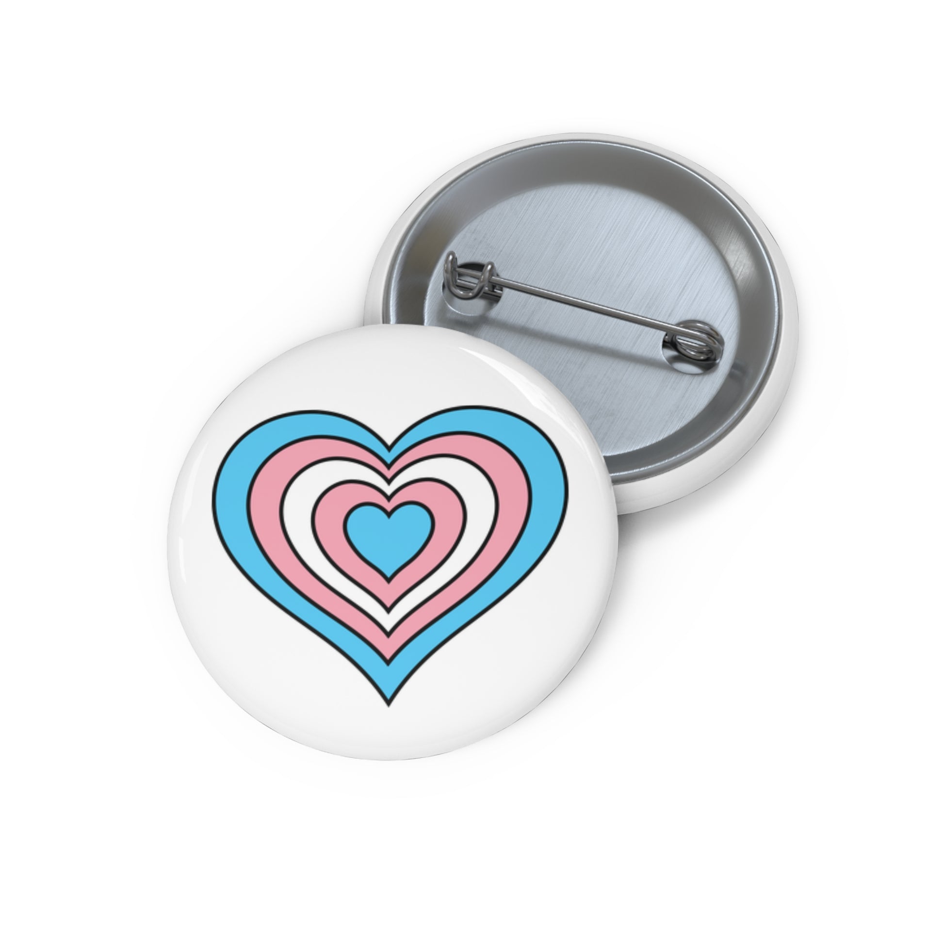 Front and back view of a white circular button with a heart-shaped transgender pride flag image. The button is shown on a white background.