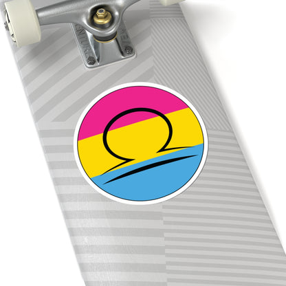 Close-up of the bottom of a silver skateboard featuring a 6 inch by 6 inch circular zodiac sticker with a centered Libra glyph on a Pansexual pride flag style background applied to the surface.
