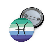 Front and back view of a circular gay men pride flag button featuring the Pisces zodiac symbol in black centered on the front.