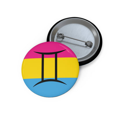 Front and back view of a circular pansexual pride flag button featuring the Gemini zodiac symbol in black centered on the front.