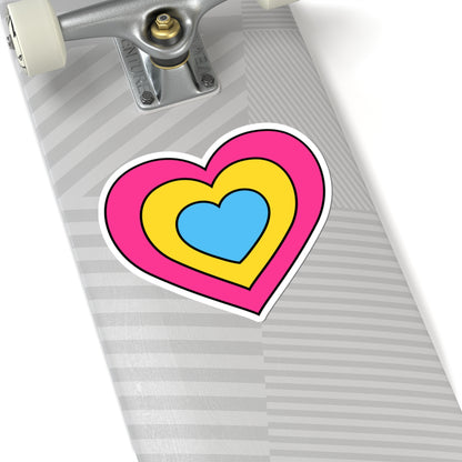 Close-up of the bottom of a silver skateboard featuring a 6 inch by 6 inch pride flag heart sticker in a Pansexual flag style applied to the surface.