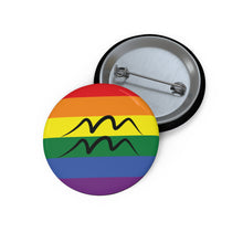Front and back view of a circular rainbow pride flag button featuring the Aquarius zodiac symbol in black centered on the front.