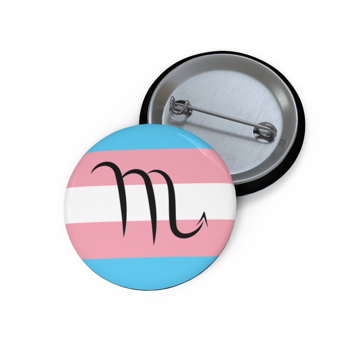 Front and back view of a circular transgender pride flag button featuring the Scorpio zodiac symbol in black centered on the front.