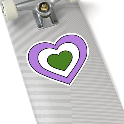 Close-up of the bottom of a silver skateboard featuring a 6 inch by 6 inch pride flag heart sticker in a Genderqueer flag style applied to the surface.