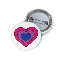 Front and back view of a white circular button with a heart-shaped bisexual flag image. The button is shown on a white background.