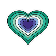 Heart-shaped gay men (MLM) pride flag sticker featuring nested heart stripes in dark green, green, light green, white, light blue, blue, and dark blue, outlined with a thin black border and a white sticker border. The sticker is shown on a white background.
