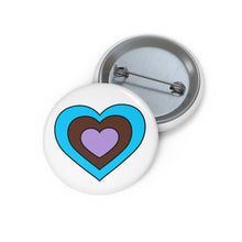 Front and back view of a white circular button with a heart-shaped androsexual flag image. The button is shown on a white background.