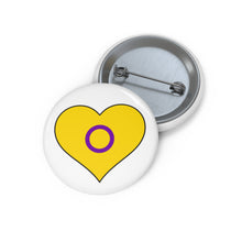 Front and back view of a white circular button with a heart-shaped Intersex flag image. The button is shown on a white background.